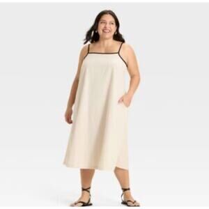 Ava & Viv tan with black dress 1X